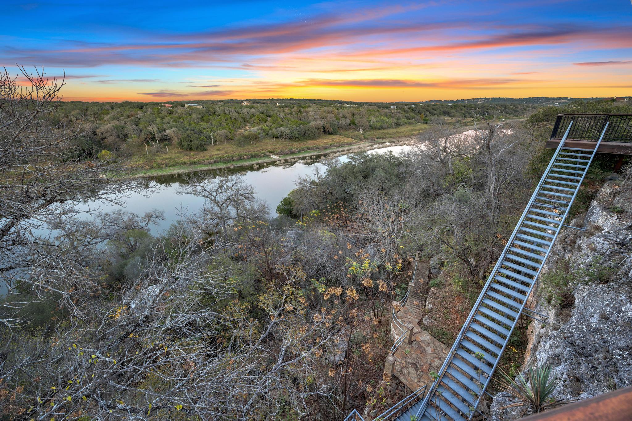 24710 Fossil Trail Spicewood, TX 78669 - Photo 34 of 40 a view of a city from a balcony