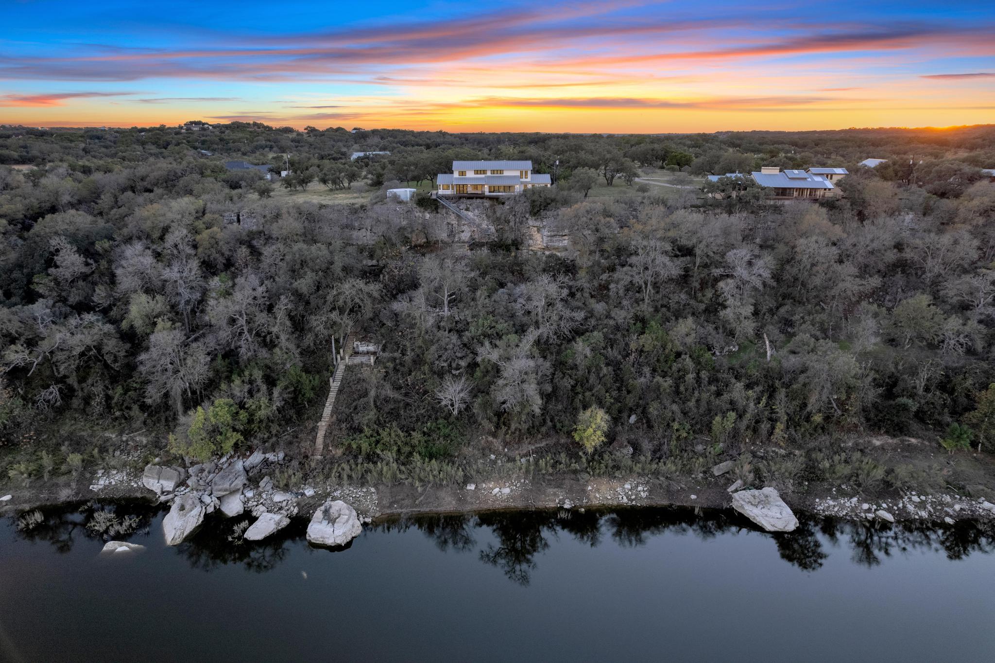 24710 Fossil Trail Spicewood, TX 78669 - Photo 35 of 40 a view of a city with ocean view