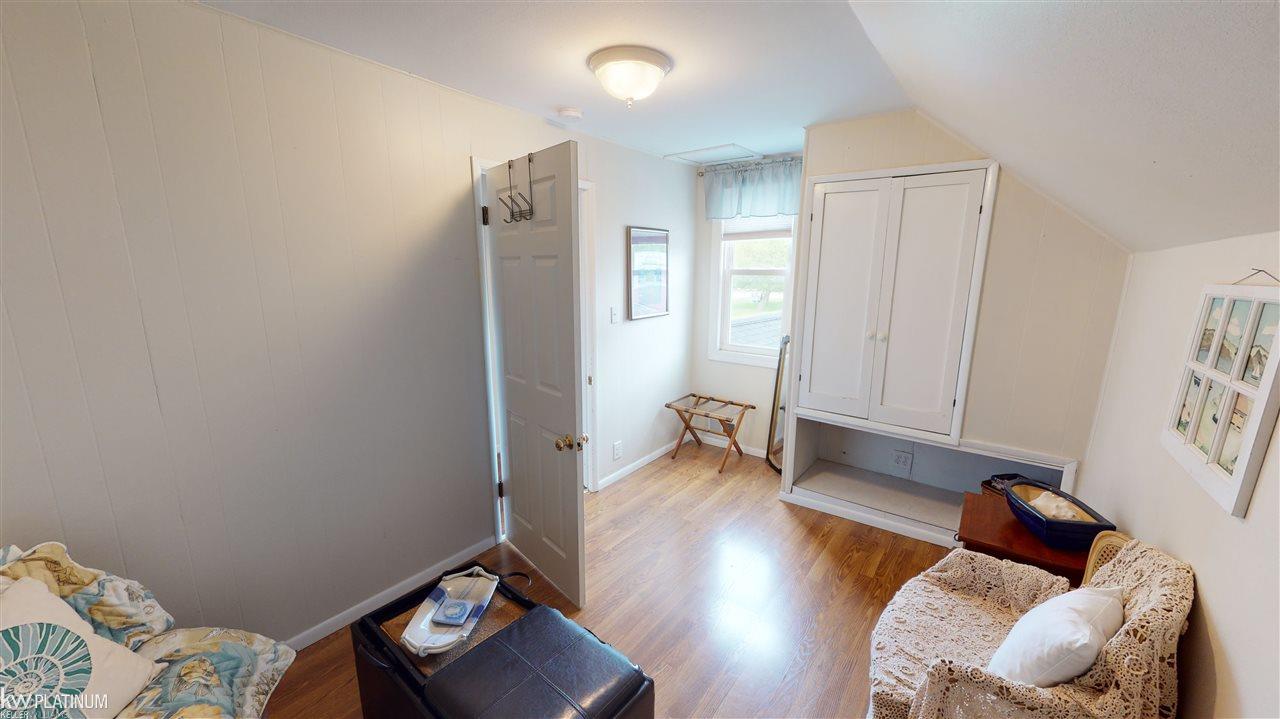 6013 Pointe Tremble Road Algonac, MI 48001 - Photo 21 of 26 Open room with window facing the driveway and quonset hut