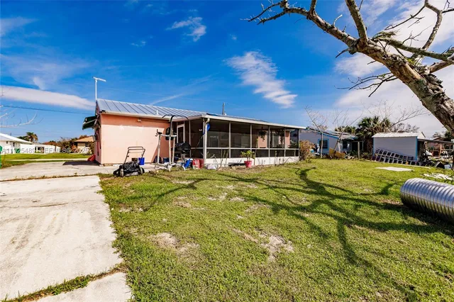 a view of a swimming pool with a patio