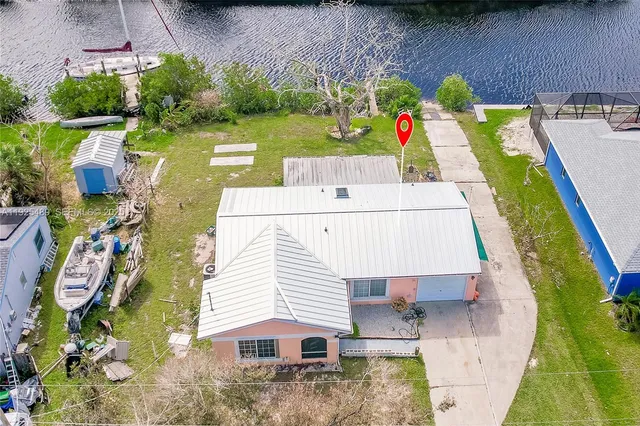 swimming pool view with a outdoor seating space