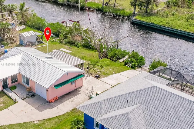 an aerial view of a house having patio