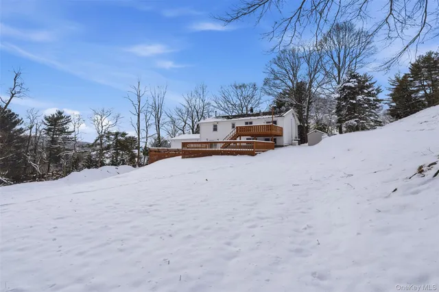 a view of a deck with a yard