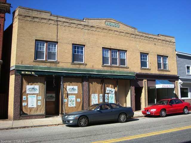 a view of a building with car windows