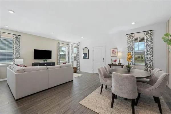 a view of a dining room with furniture
