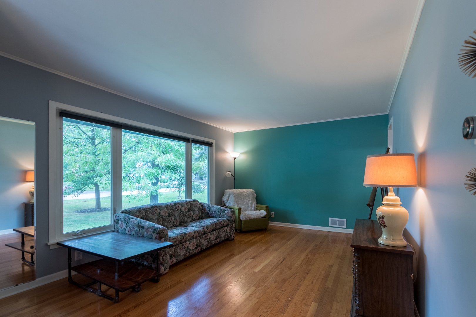 2941 Birch Road Homewood, IL 60430 - Photo 2 of 15 a living room with furniture and a lamp