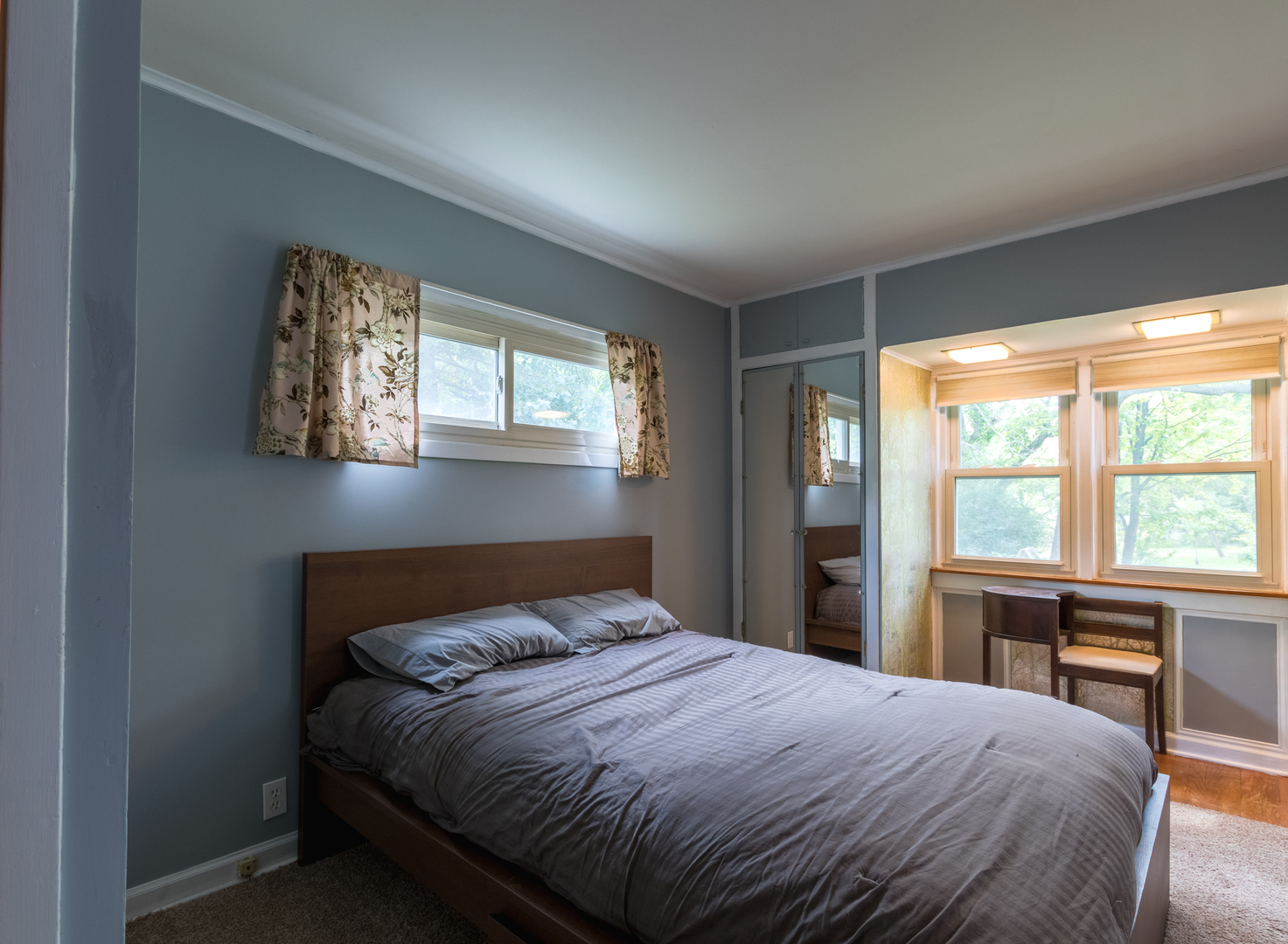 2941 Birch Road Homewood, IL 60430 - Photo 7 of 15 a bedroom with a large bed and a large window