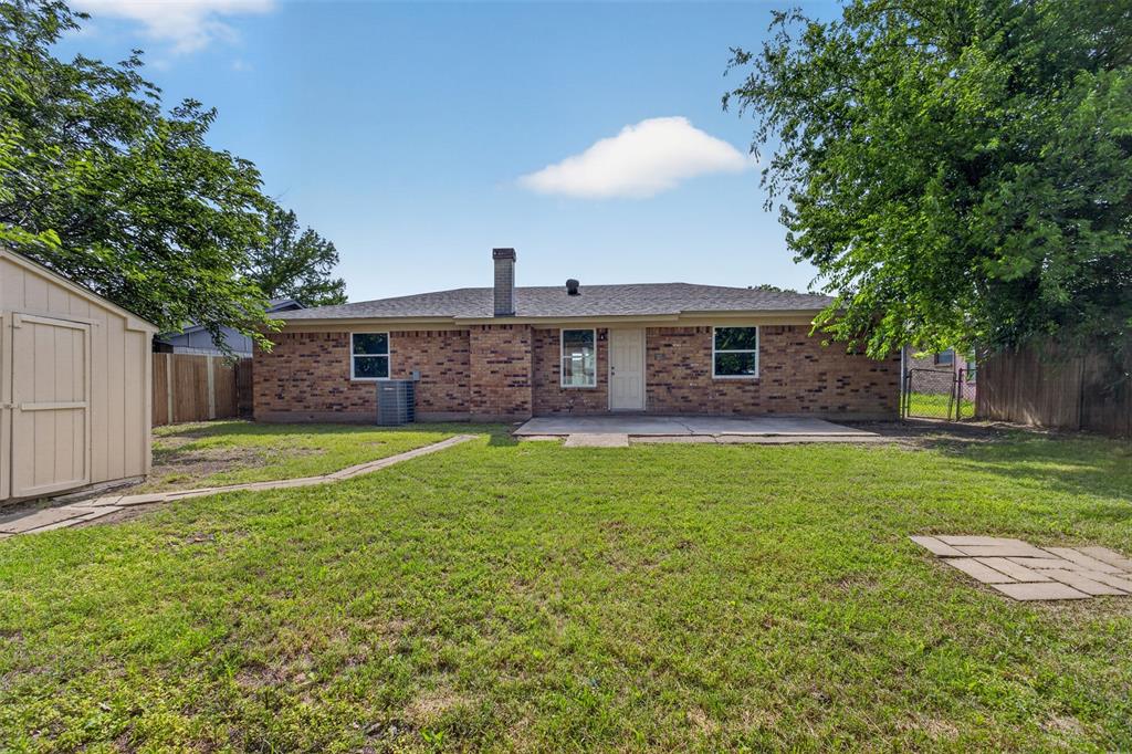 7528 Meadowlark Lane North Watauga, TX 76148 - Photo 26 of 31 a view of a house with a backyard