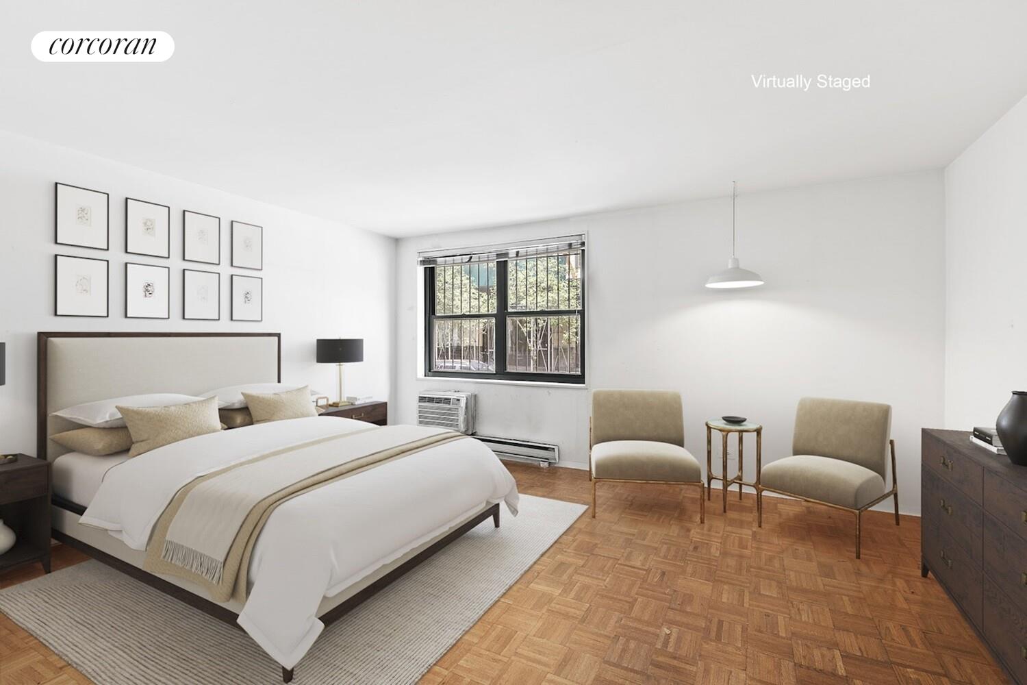 618 Washington Street, Unit GA Manhattan, NY 10014 - Photo 6 of 14 a bedroom with a bed and a couch with window