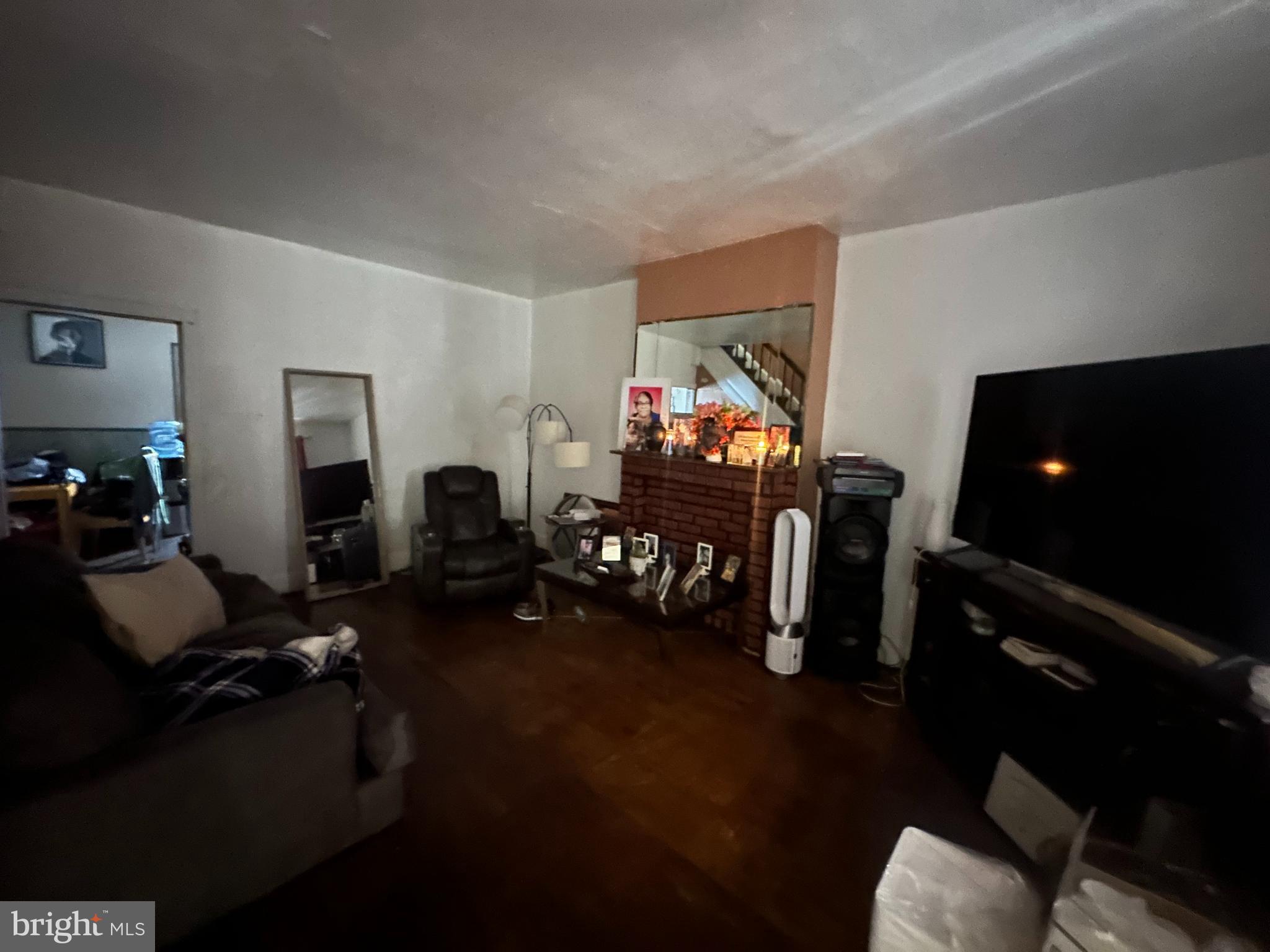 5024 Duffield Street Philadelphia, PA 19124 - Photo 4 of 18 a living room with furniture and a flat screen tv