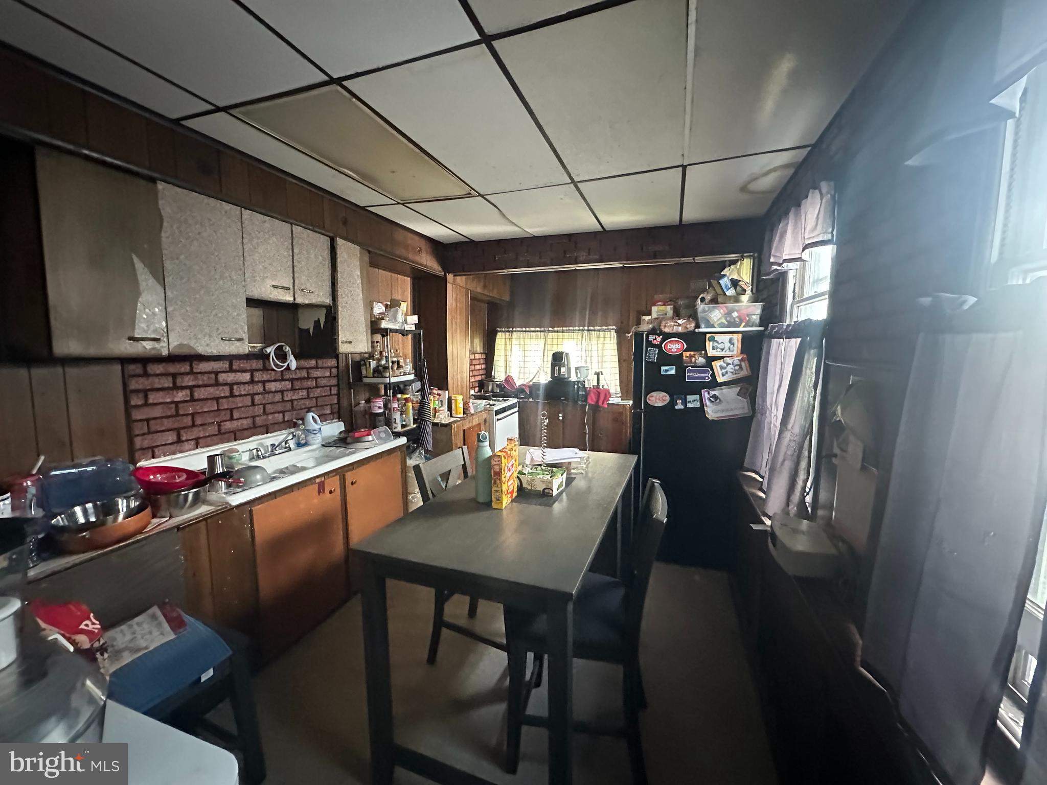 5024 Duffield Street Philadelphia, PA 19124 - Photo 7 of 18 a kitchen with stainless steel appliances granite countertop a sink stove and cabinets