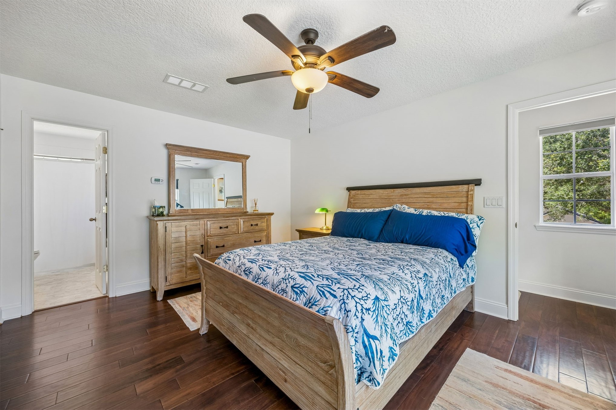 86107 Remsenburg Drive Fernandina Beach, FL 32034 - Photo 25 of 58 a bedroom with a bed and window