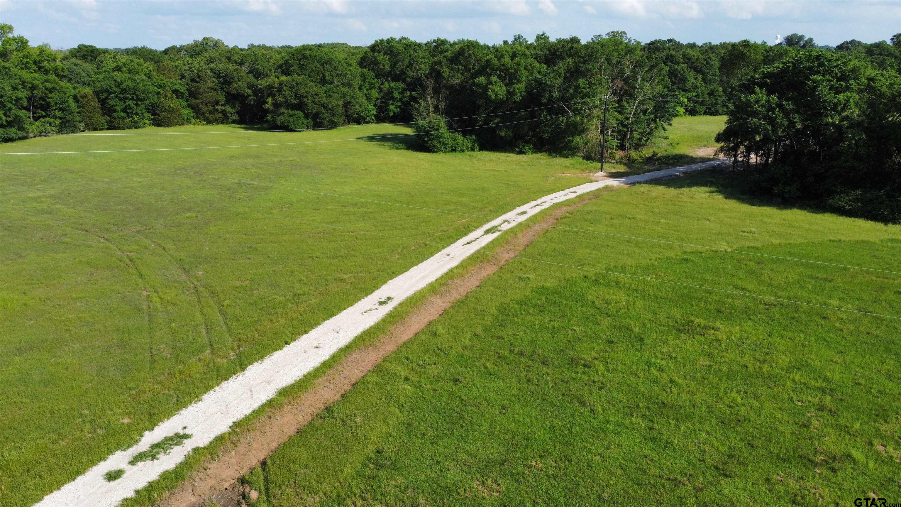 388 C R 3160 Emory, TX 75440 - Photo 3 of 13 a view of a field with an ocean view