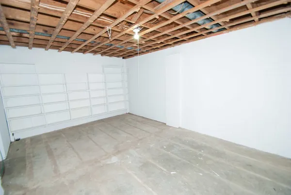 a view of a room with racks on the wall