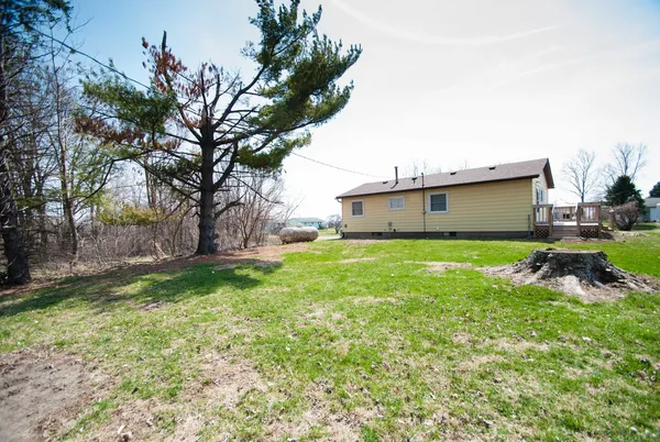 a view of a backyard with a garden