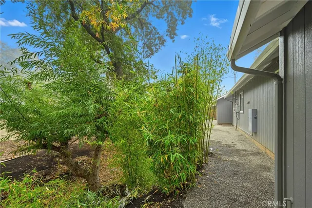 a backyard of a house with lots of green space