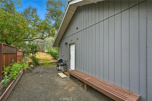 a house with trees in the background
