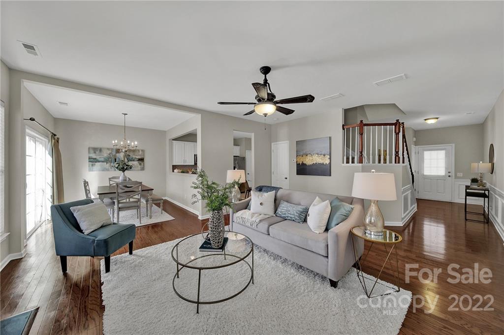 9168 Redmond Trace Road Charlotte, NC 28277 - Photo 4 of 24 a living room with furniture and a wooden floor