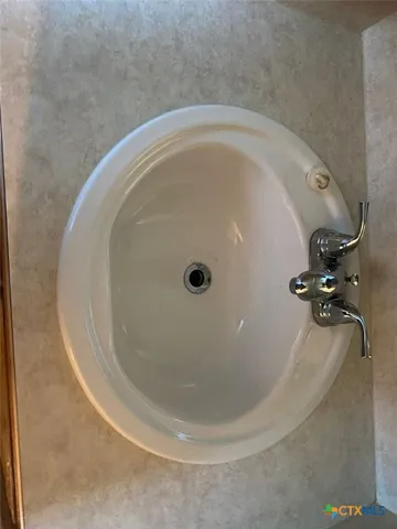 a close view of a sink in the bathroom