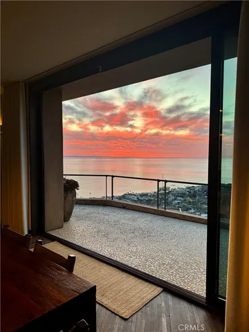 a bathroom with a sink mirror and a window