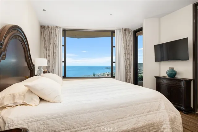 a living room filled with furniture and a table
