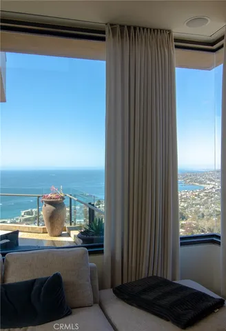 a bathroom with a shower a mirror and a sink