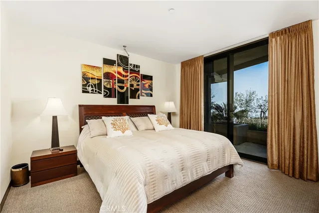 a bathroom with a sink mirror and a table