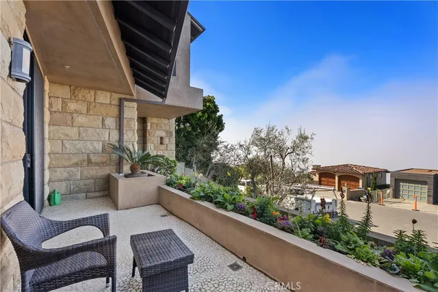 a room with wooden floor and furniture