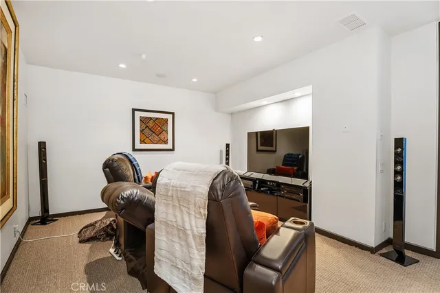 a large kitchen with a table and chairs