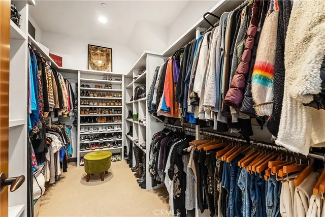 a living room filled with furniture and a table