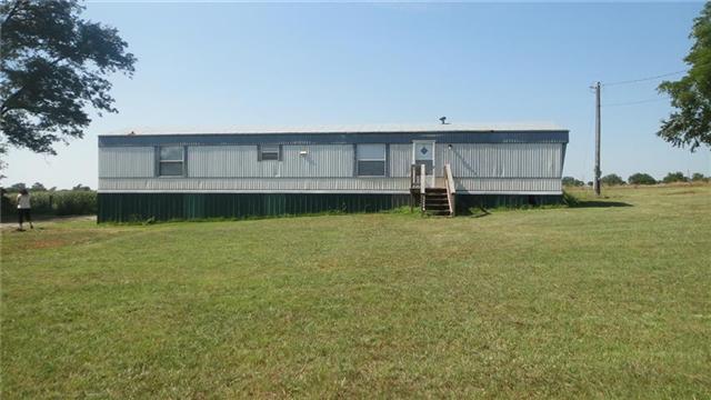 7122 Buncombe Road Belvidere, TN 37306 - Photo 1 of 15 MOVE-IN READY inviting 2 bedroom/2 bath manufactured home with 1056 square feet of living space situated on 1 acre.