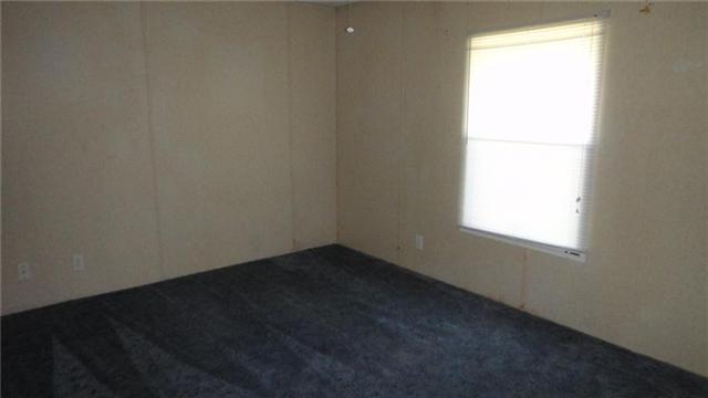 7122 Buncombe Road Belvidere, TN 37306 - Photo 10 of 15 Whether you plan to sleep friends or family, the guest bedroom or den fills the bill with ample closet space and a full bath nearby.