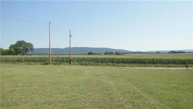 7122 Buncombe Road Belvidere, TN 37306 - Photo 12 of 15 In the summer, the backyard may host a friends and family barbecues, complete with lawn darts, and badminton.