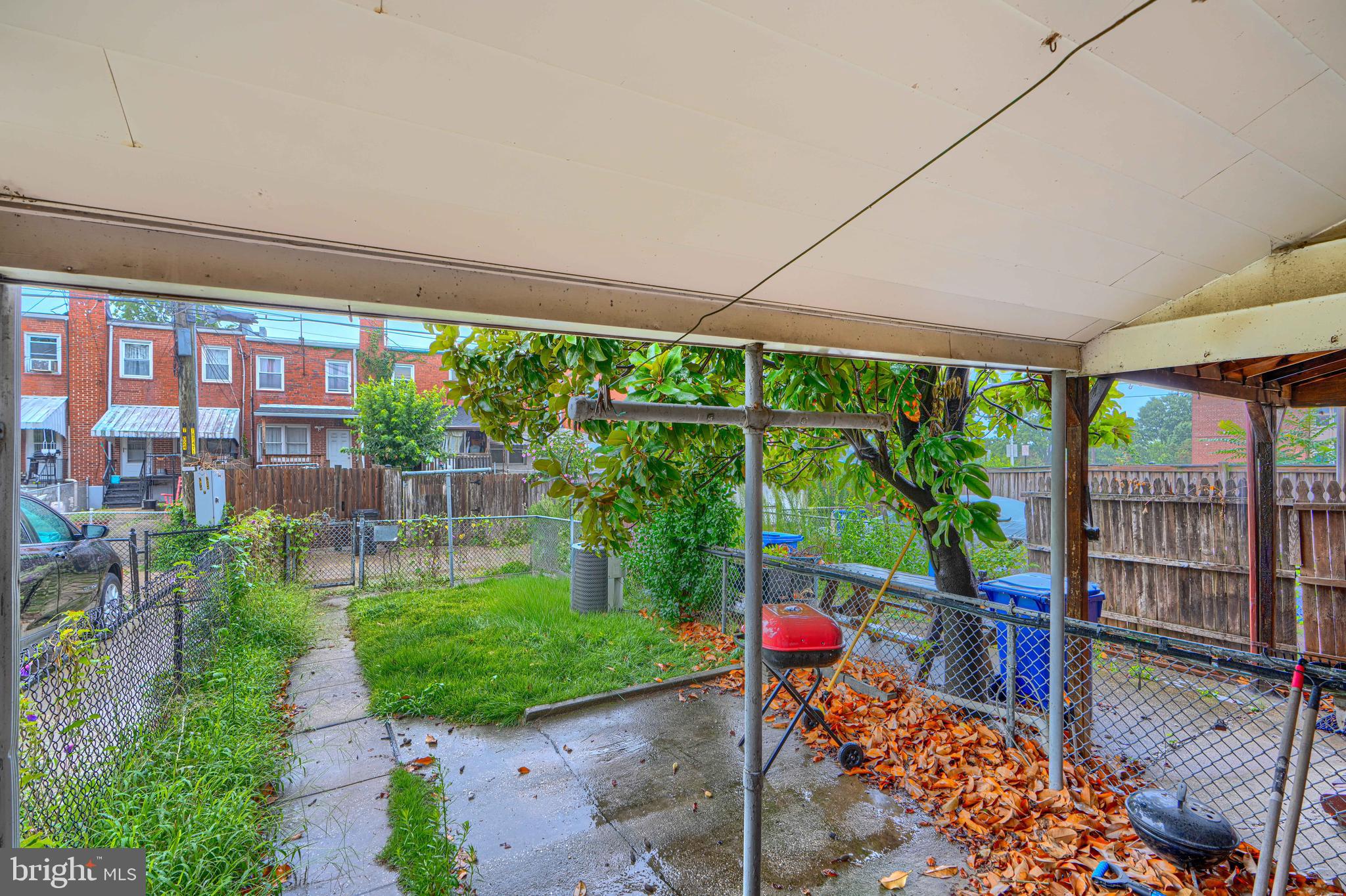 308 Imla Street Baltimore, MD 21224 - Photo 19 of 22 Rear yard view w/ covered porch