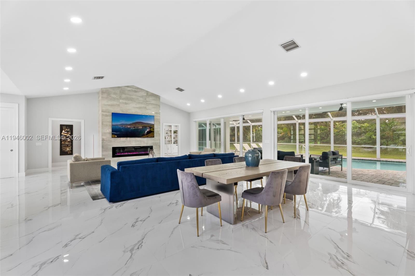 17 Surrey Road Palm Beach Gardens, FL 33418 - Photo 12 of 43 a view of a dining room with furniture window and outside view