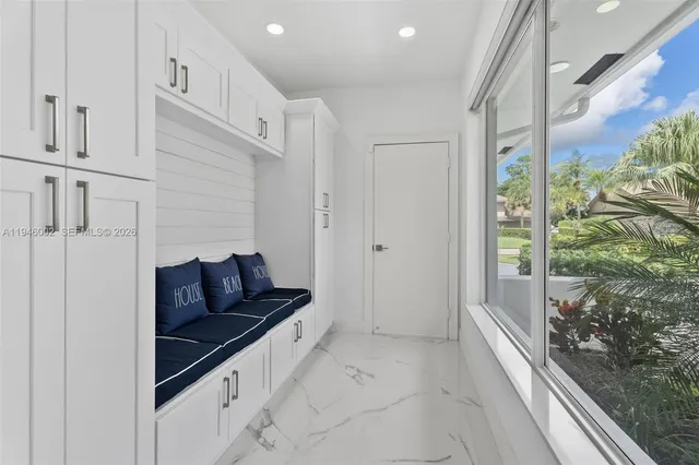 a living room with furniture and a gate