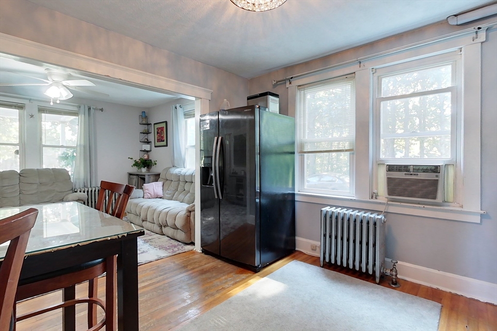 3 Warren Road Townsend, MA 01469 - Photo 7 of 38 a kitchen with stainless steel appliances granite countertop a refrigerator and a view of living room