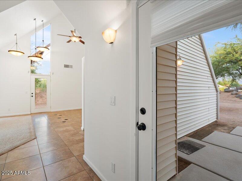 2648 N Ridge Mesa, AZ 85203 - Photo 22 of 38 22-en-suite hallway and entrance