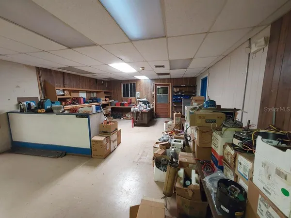 a view of empty room with windows