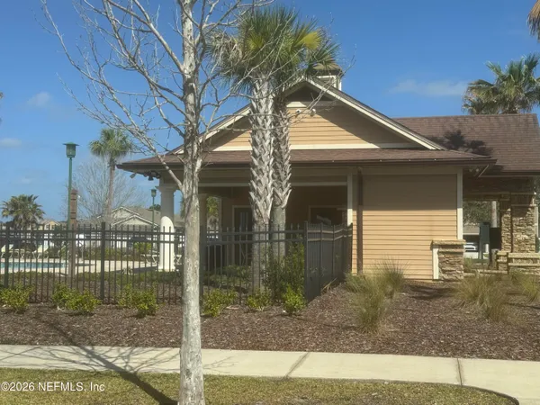 a front view of a house with a porch