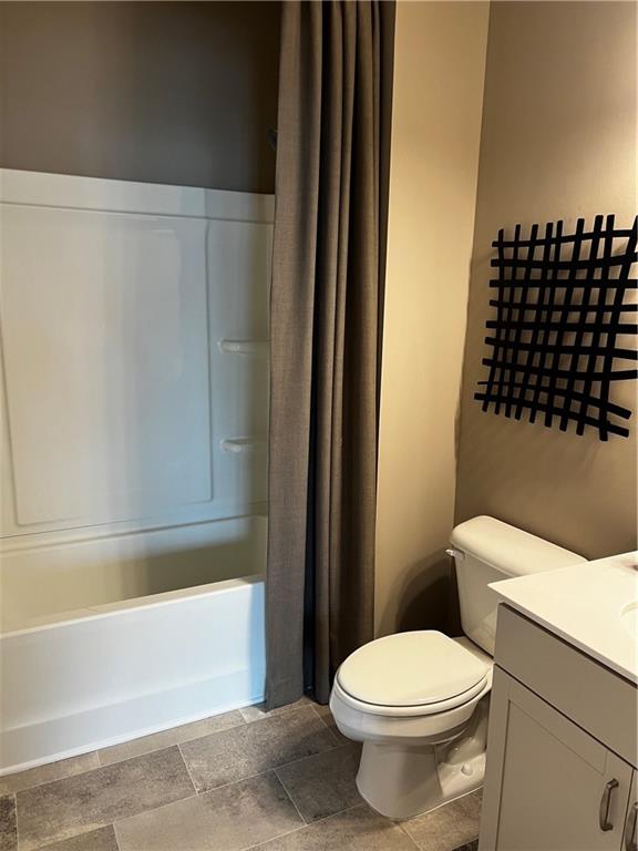 243 Witter Way Woodstock, GA 30188 - Photo 24 of 45 a bathroom with a toilet and a shower