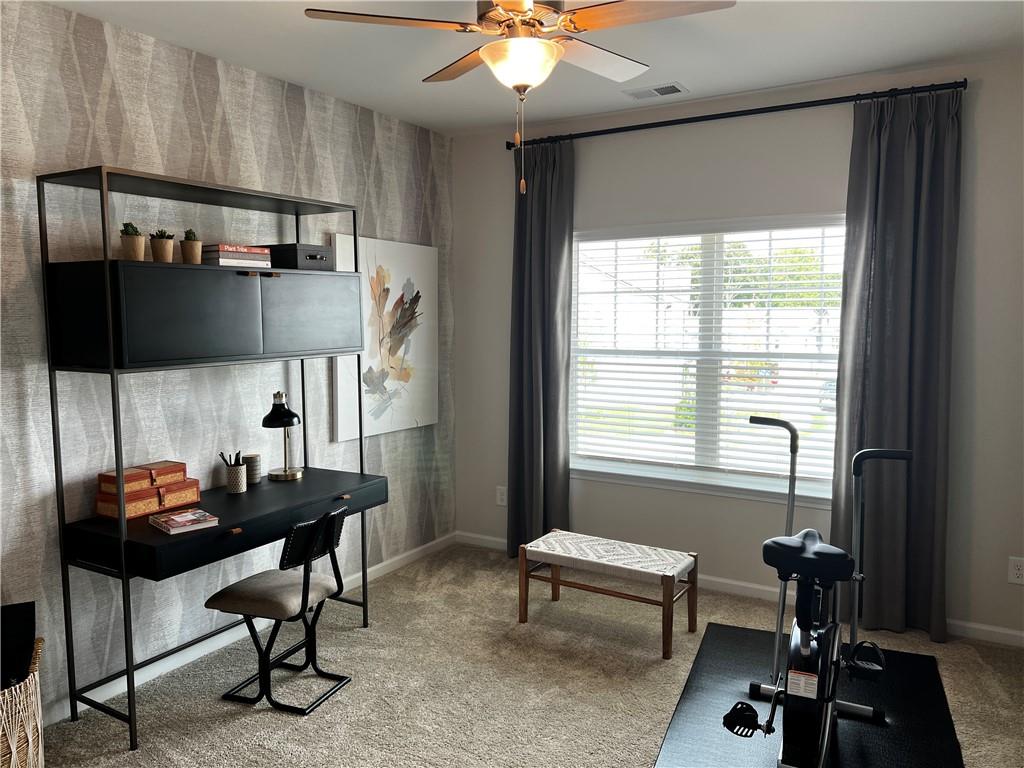 243 Witter Way Woodstock, GA 30188 - Photo 25 of 45 a room with furniture and a window