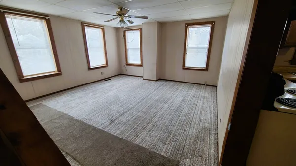 an empty room with windows