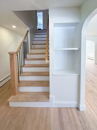 a view of entryway with wooden floor