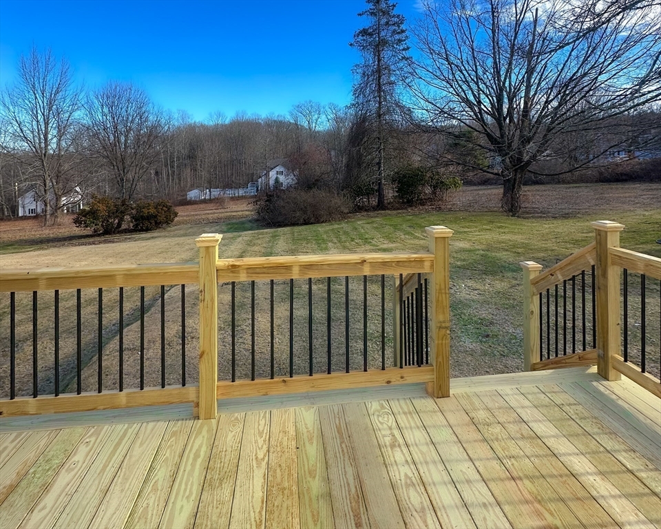 39 Prospect Street Auburn, MA 01501 - Photo 3 of 4 a view of swimming pool with an outdoor space and seating area