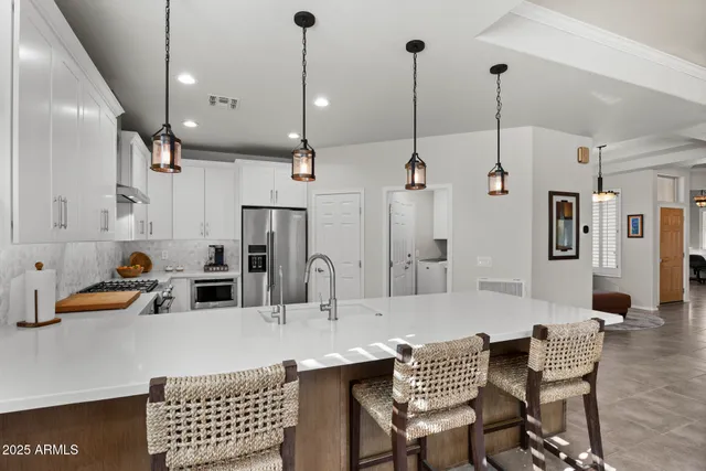 a view of kitchen and dining area with furniture