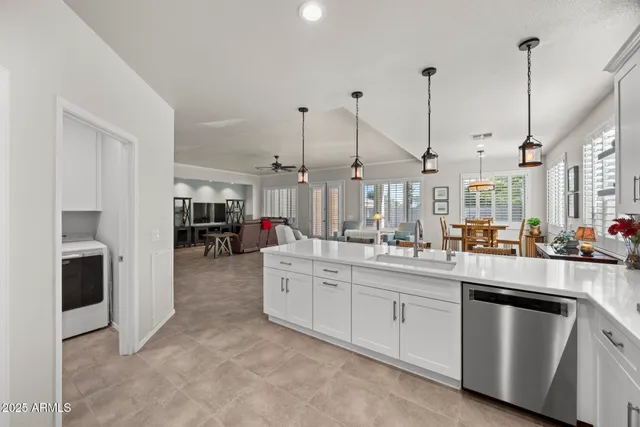 a kitchen with appliances and cabinets