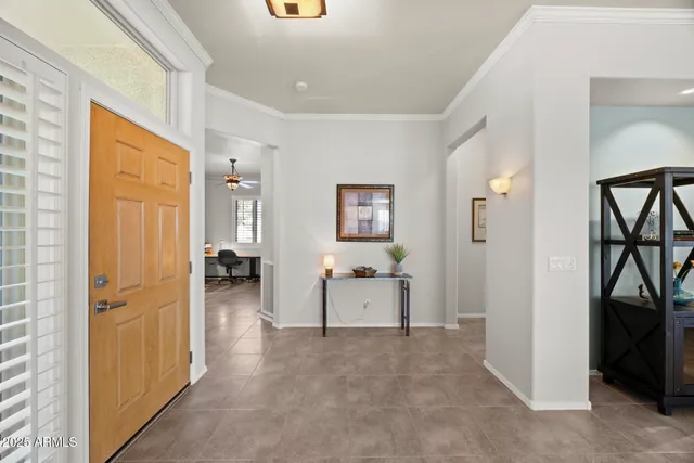 a view of a livingroom with furniture and windows