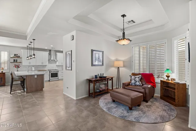 a living room with furniture and window