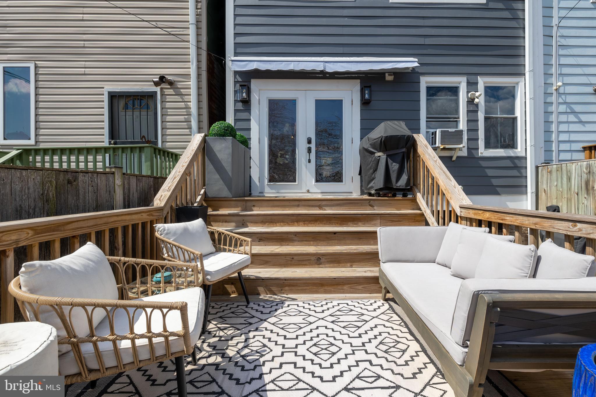 422 17th Street Southeast Washington, DC 20003 - Photo 30 of 59 Two-Tiered Deck into Backyard